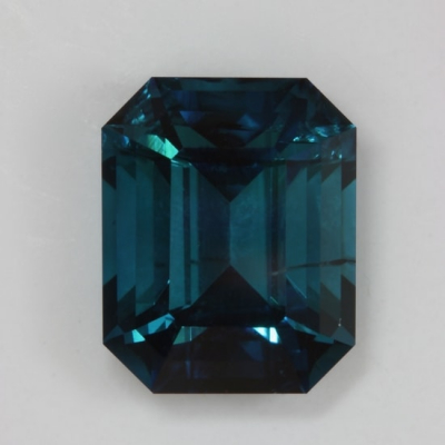 emerald cut blue unstable tourmaline gem open ends