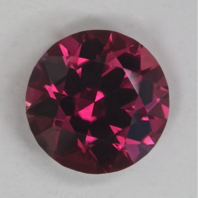 brilliant rich pink included tourmaline gem