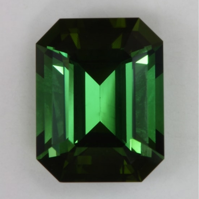 emerald cut green included tourmaline gem
