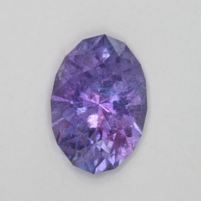 oval included blue medium tourmaline gem