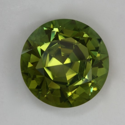 deep round rich yellow green eye clean tourmaline gem