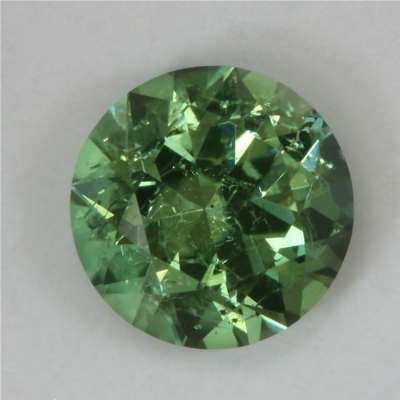 brilliant green included tourmaline gem