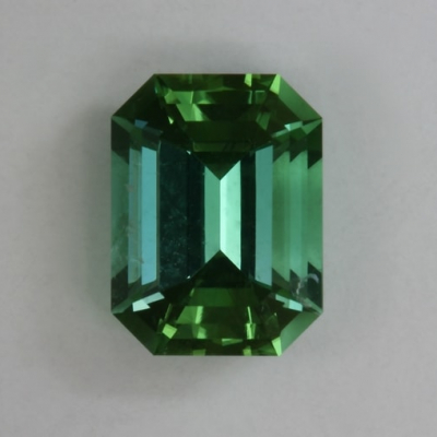 emerald cut blue green included tourmaline gem