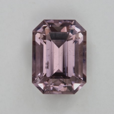 emerald cut non-copper purple included tourmaline gem