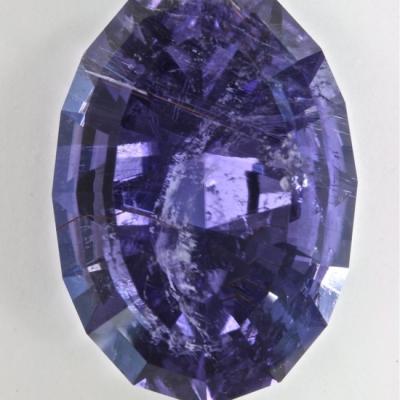 oval included purple copper tourmaline gem