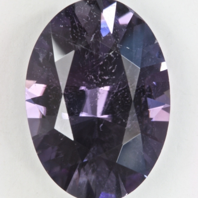 oval copper included blue purple tourmaline gem