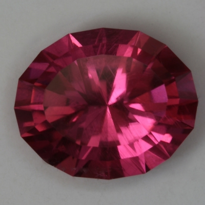 oval hot pink tourmaline gem included