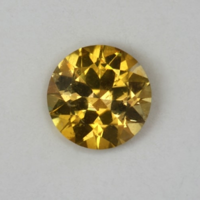 standard round brilliant yellow eye clean tourmaline gem
