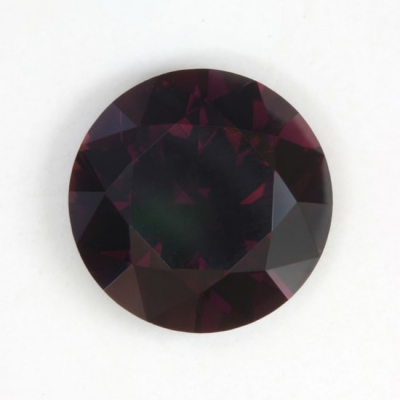 brilliant dark red included tourmaline gem