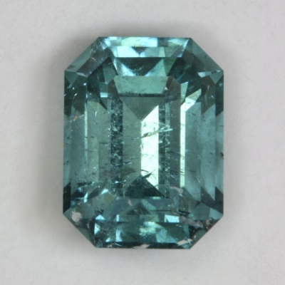 emerald cut blue included tourmaline gem